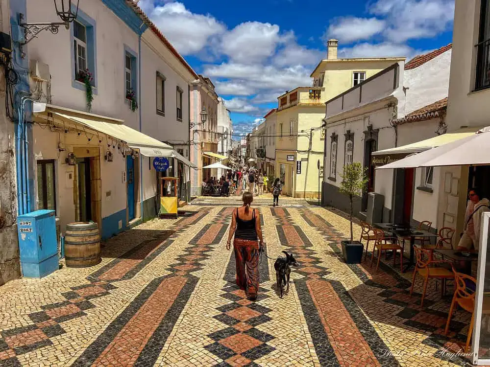 Charming historic old town streets of Lagos with traditional patterned calçada cobblestones