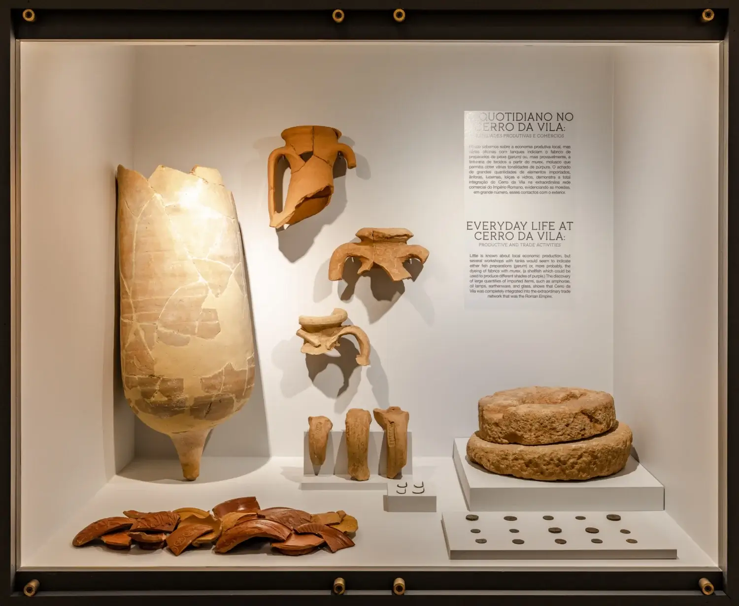 The open-air ancient stone ruins of a historic Roman villa layout displayed at the Cerro da Vila Archaeological Museum in Vilamoura