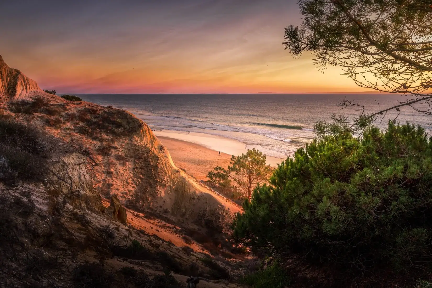 Falésia Beach near Vilamoura with golden sand and red cliffs