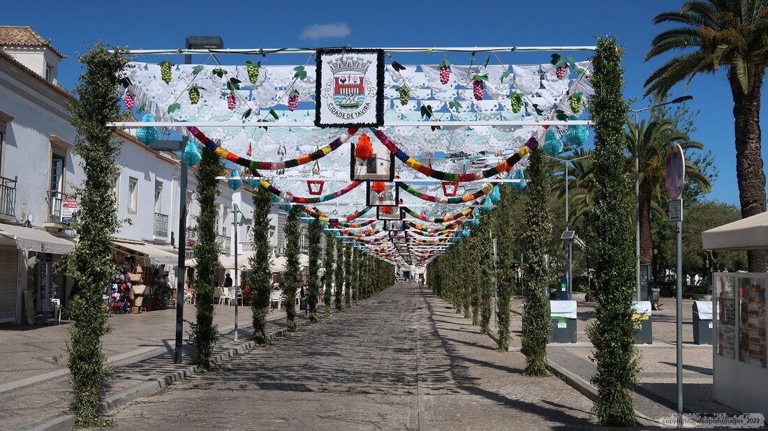Vibrant streets of Tavira during the traditional Festa de São João celebrations