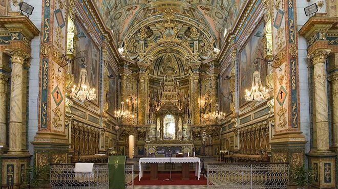 The impressive white baroque facade of the historic Igreja do Carmo church in Tavira