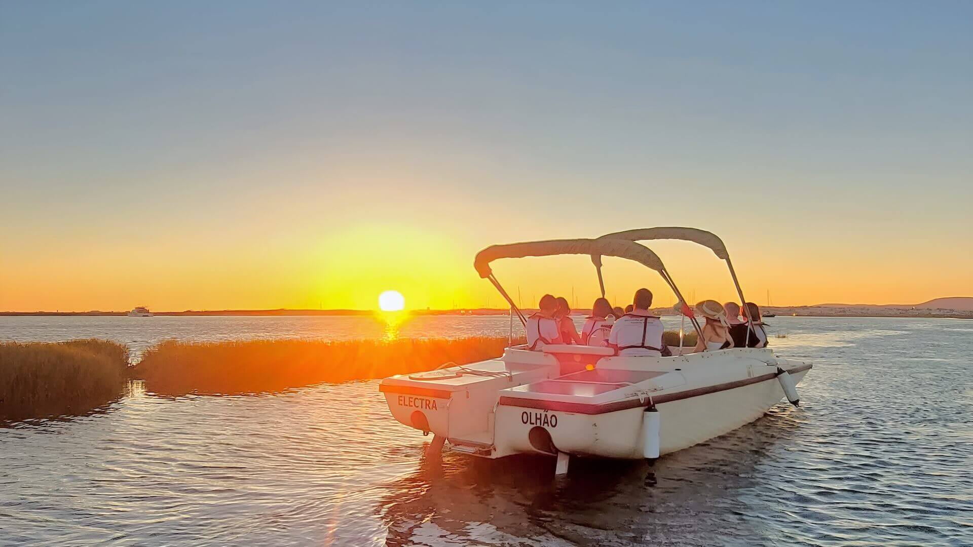 Tourists boarding a Ria Formosa boat trip from Olhão, close to Tavira in the eastern Algarve