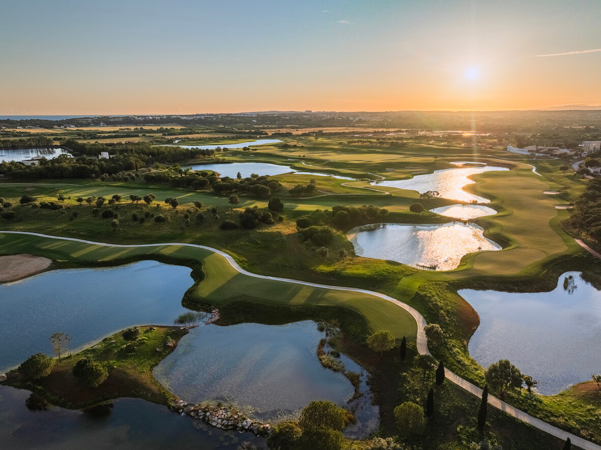 Perfectly manicured putting greens and smooth sand bunkers at The Els Club Vilamoura golf course complex